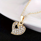 A 4-piece fashion jewelry set that includes rhinestone jewelry, including peach heart pendant necklaces, rings, studs, and bracelets, perfect for everyday wear or parties. mbzr