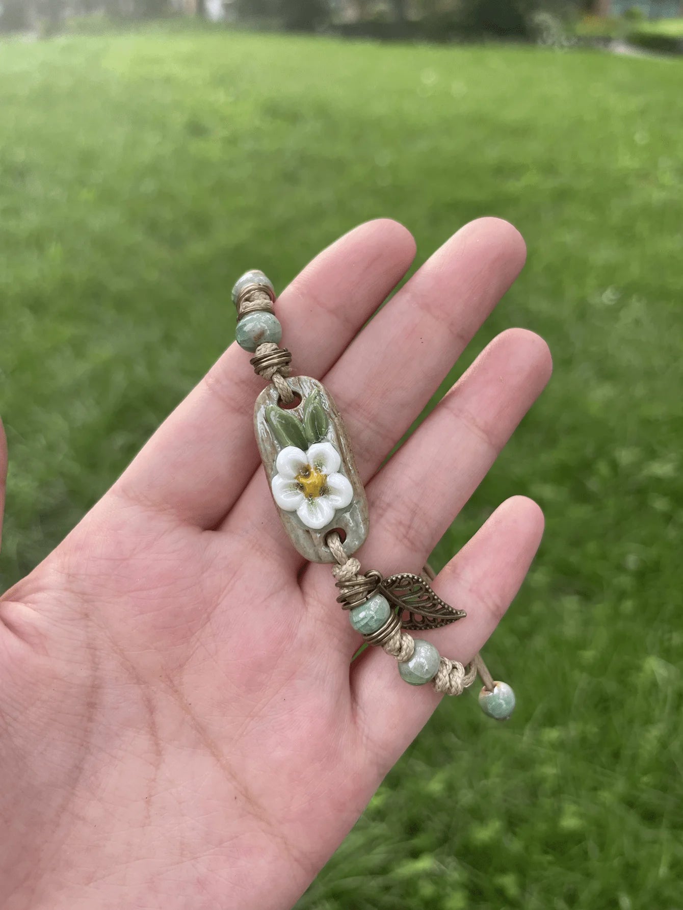 Ceramic Flower Charm Bracelet With Green Beads Adjustable Woven Design For Daily Wear mbzr