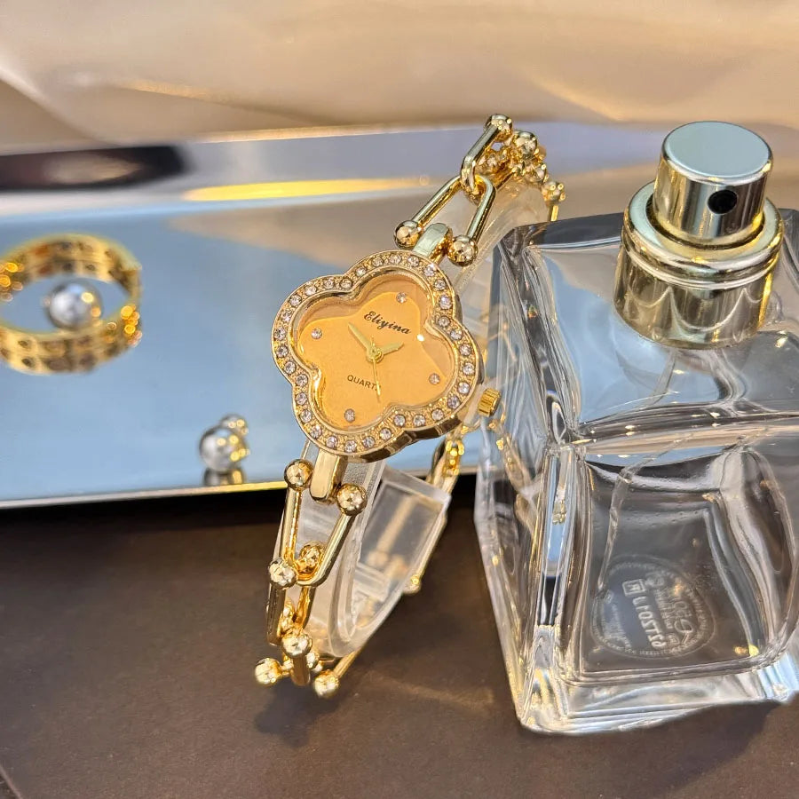 Lucky Four-Leaf Clover Design Women's Watch with Gold Chain and Gem-Studded Bezel mbzr