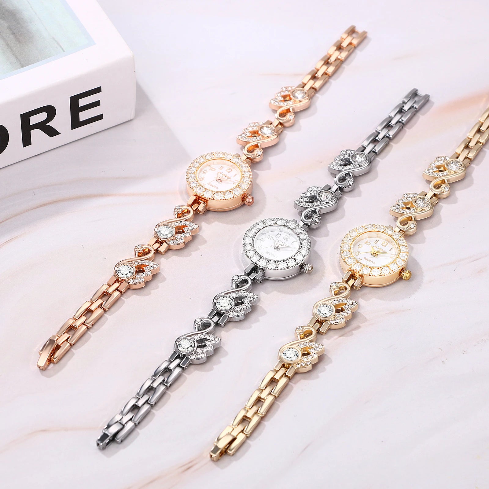 Ladies Watch Quartz Ultra thin full diamond case Arabic numerals scale full diamond cygnet decorated watch band Ladies bracelet