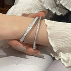Diamond-encrusted stainless steel clasp bracelet, fashionable and light luxury plated women's bracelet, elegant and versatile