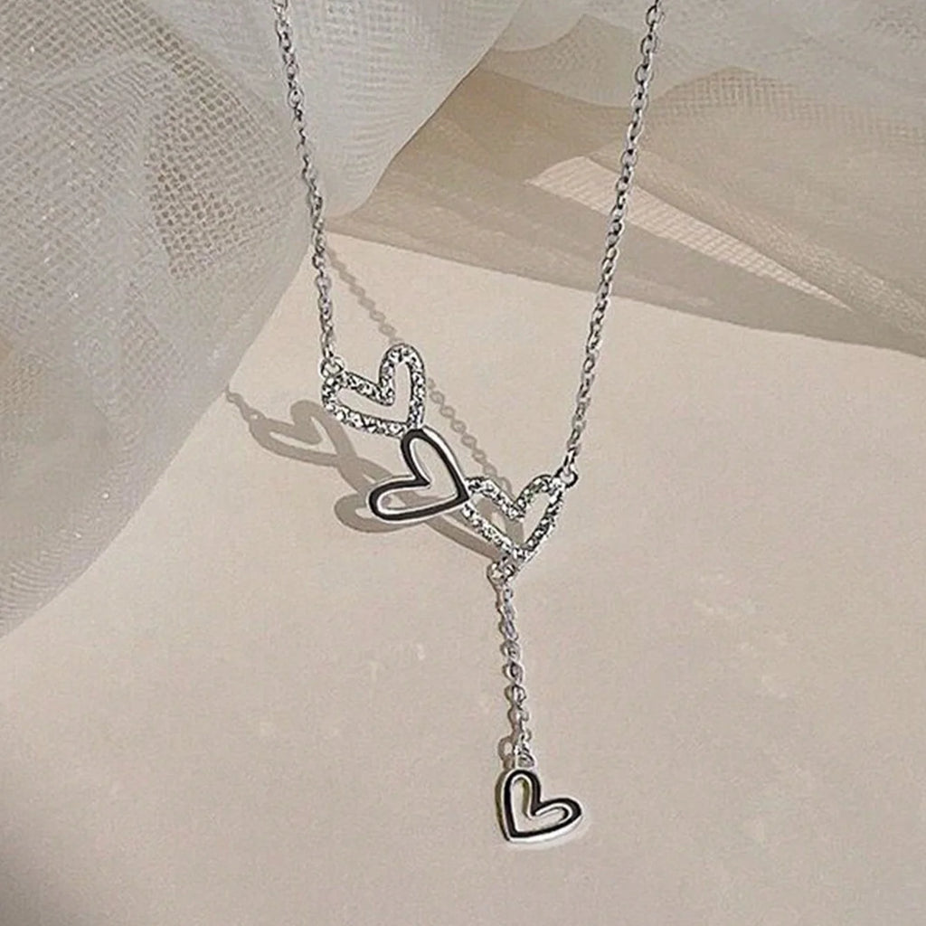 An elegant and minimalist rhinestone three-love fringed pendant necklace with a luxurious and versatile design for ladies, brides, engagement jewelry, girlfriends or Valentine's Day gifts.