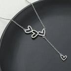 An elegant and minimalist rhinestone three-love fringed pendant necklace with a luxurious and versatile design for ladies, brides, engagement jewelry, girlfriends or Valentine's Day gifts.