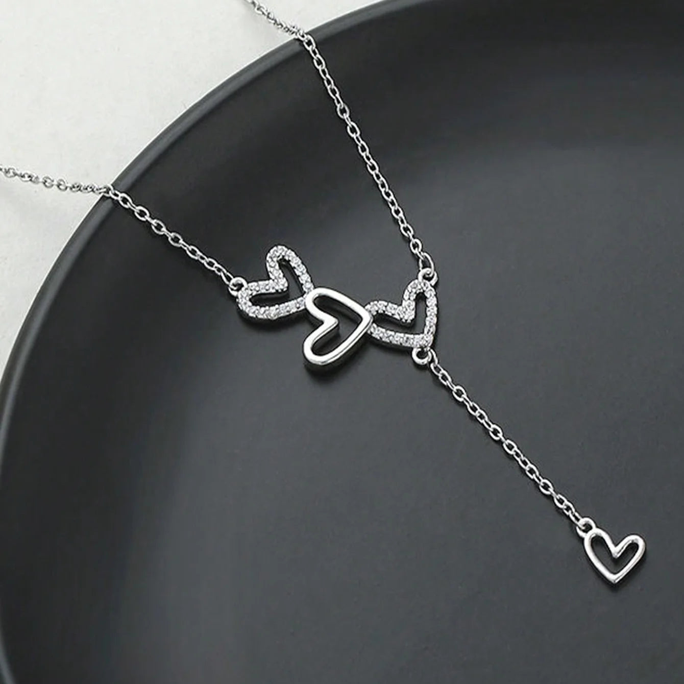 An elegant and minimalist rhinestone three-love fringed pendant necklace with a luxurious and versatile design for ladies, brides, engagement jewelry, girlfriends or Valentine's Day gifts.