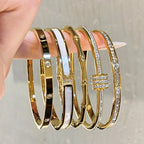 Diamond-encrusted stainless steel clasp bracelet, fashionable and light luxury plated women's bracelet, elegant and versatile