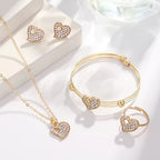 A 4-piece fashion jewelry set that includes rhinestone jewelry, including peach heart pendant necklaces, rings, studs, and bracelets, perfect for everyday wear or parties. mbzr