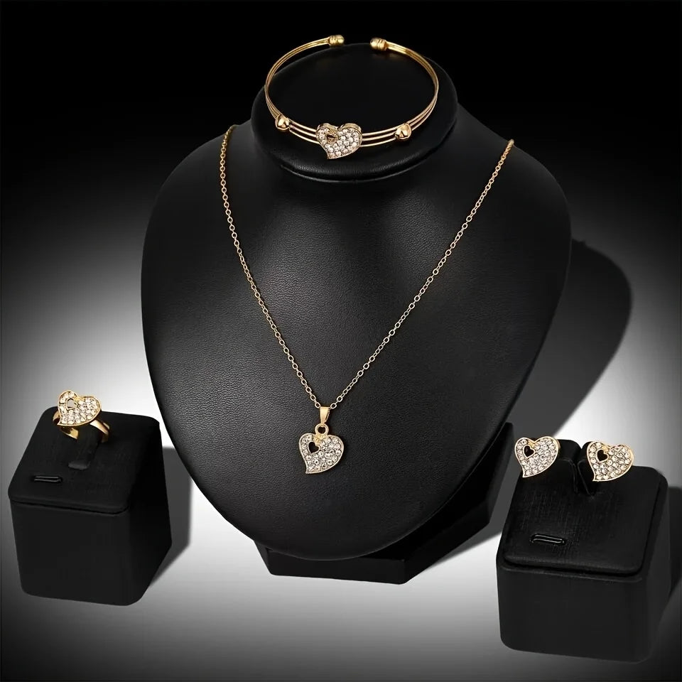 A 4-piece fashion jewelry set that includes rhinestone jewelry, including peach heart pendant necklaces, rings, studs, and bracelets, perfect for everyday wear or parties. mbzr
