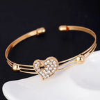 A 4-piece fashion jewelry set that includes rhinestone jewelry, including peach heart pendant necklaces, rings, studs, and bracelets, perfect for everyday wear or parties. mbzr